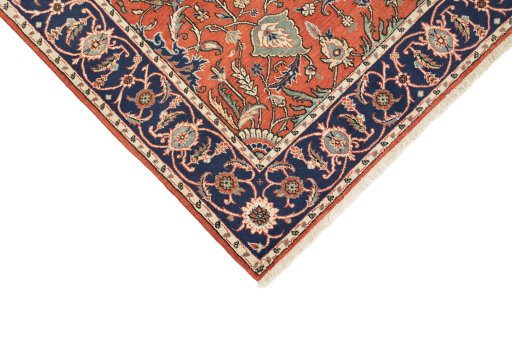 Backside of handmade 1980s Kashan rug showing knot structure and weave density