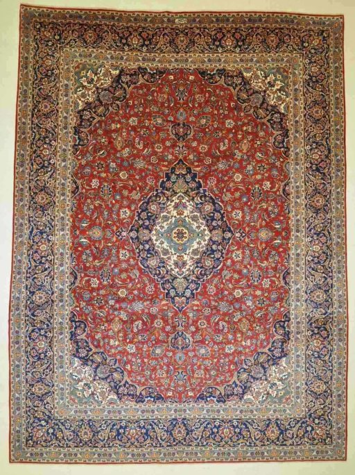 Full view of 2000s Kashan rug from Iran / Persia, 406 × 296 cm in Red tones
