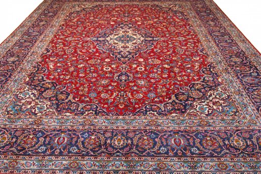 Surface texture of 2000s Kashan rug with natural Wool and intricate pattern