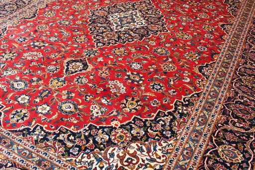 Close-up detail of 2000s Kashan rug from Iran / Persia showing Wool weave