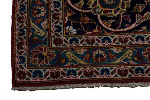 Surface texture of 2000s Kashan rug with natural Wool and intricate pattern
