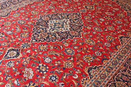 Full view of 2000s Kashan rug from Iran / Persia, 400 × 294 cm in Red tones