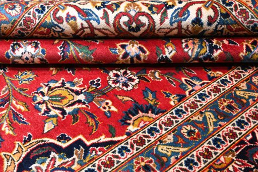 Central medallion detail of 2000s Kashan rug from Iran / Persia