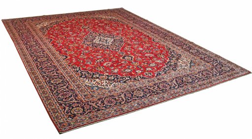 Corner detail of 2000s Kashan rug showing border pattern and Wool pile
