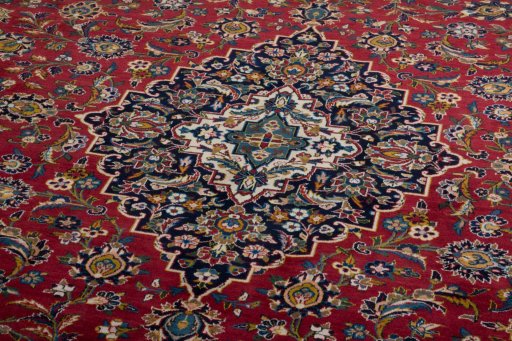 Close-up detail of 2000s Kashan rug from Iran / Persia showing Wool weave