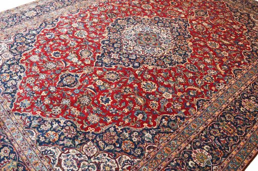 Close-up detail of 2000s Kashan rug from Iran / Persia showing Wool weave