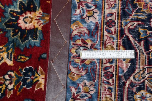 Full view of 2000s Kashan rug from Iran / Persia, 417 × 303 cm in Red tones