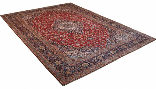Corner detail of 2000s Kashan rug showing border pattern and Wool pile