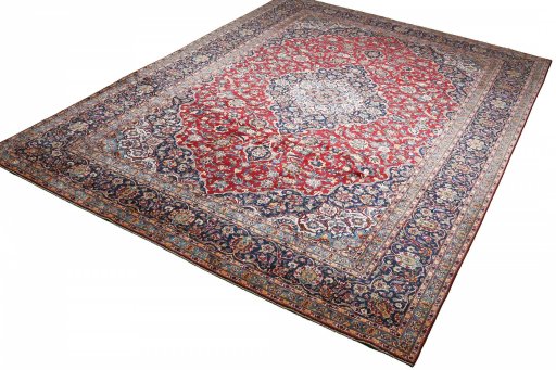 Close-up detail of 2000s Kashan rug from Iran / Persia showing Wool weave
