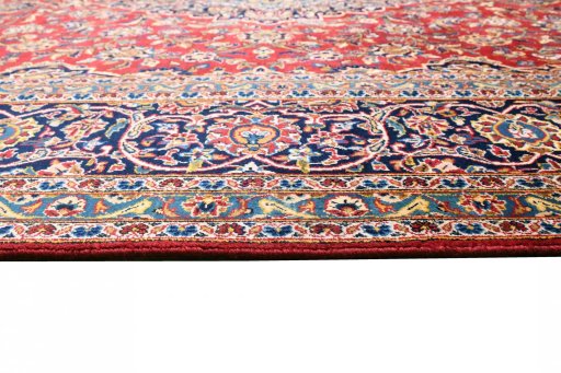 Surface texture of 2000s Kashan rug with natural Wool and intricate pattern