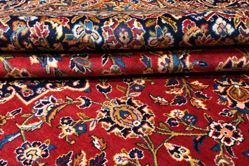 Full view of 2000s Kashan rug from Iran / Persia, 400 × 298 cm in Red tones