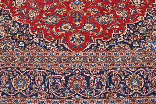 Full view of 2000s Kashan rug from Iran / Persia, 400 × 298 cm in Red tones