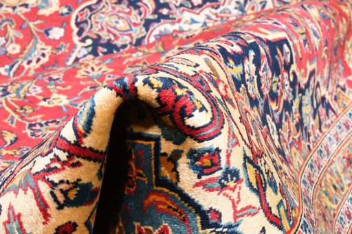 Surface texture of 2000s Kashan rug with natural Wool and intricate pattern