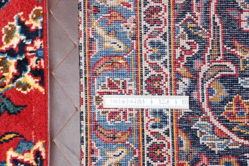 Central medallion detail of 2000s Kashan rug from Iran / Persia