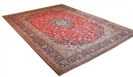 Corner detail of 2000s Kashan rug showing border pattern and Wool pile