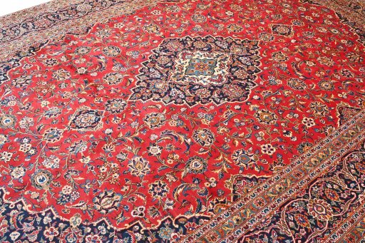 Full view of 2000s Kashan rug from Iran / Persia, 422 × 306 cm in Red tones