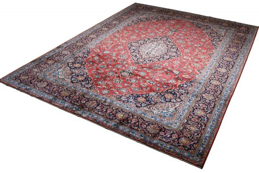 Close-up detail of 2000s Kashan rug from Iran / Persia showing Wool weave