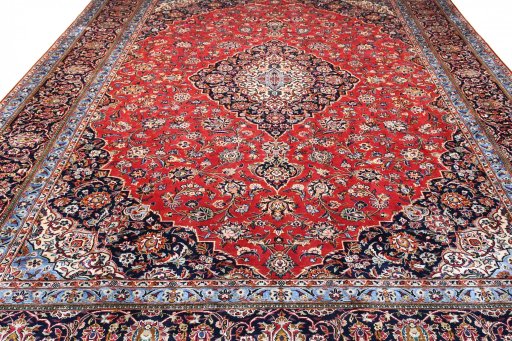 Close-up detail of 2000s Kashan rug from Iran / Persia showing Wool weave