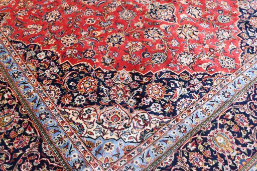 Full view of 2000s Kashan rug from Iran / Persia, 418 × 301 cm in Red tones