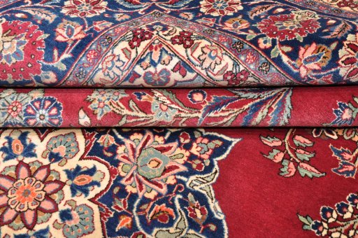 Full view of 1930s Kashan rug from Iran / Persia, 374 × 263 cm in Red tones