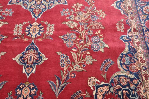 Backside of handmade 1930s Kashan rug showing knot structure and weave density