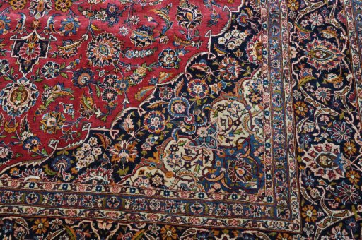Surface texture of 1970s Kashan rug with natural Wool and intricate pattern