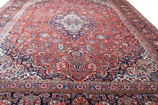 Surface texture of 1930s Kashan rug with natural Wool and intricate pattern
