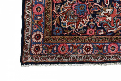 Close-up detail of 1930s Kashan rug from Iran / Persia showing Wool weave