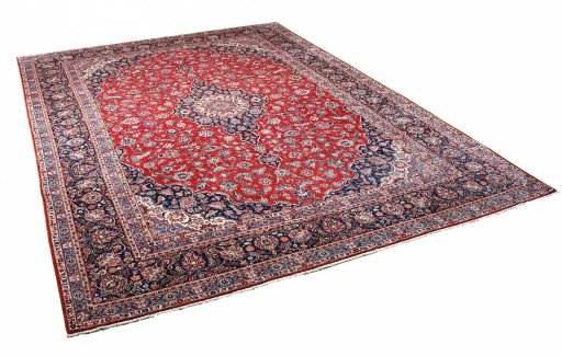 Corner detail of 1970s Kashan rug showing border pattern and Wool pile