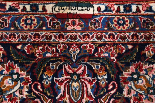 Close-up detail of 1970s Kashan rug from Iran / Persia showing Wool weave