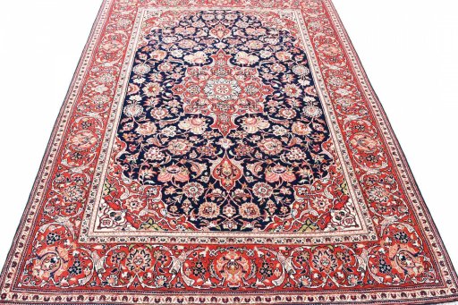 Surface texture of 1930s Kashan rug with natural Wool and intricate pattern