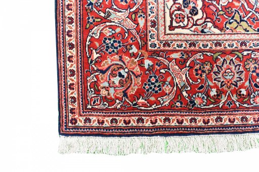 Close-up detail of 1930s Kashan rug from Iran / Persia showing Wool weave