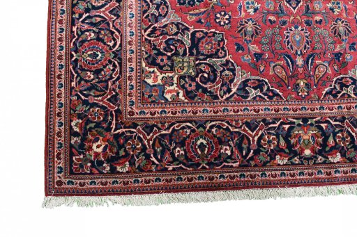 Corner detail of 1930s Kashan rug showing border pattern and Cork pile