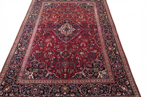 Surface texture of 1930s Kashan rug with natural Cork and intricate pattern