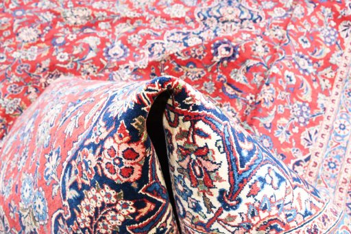 Surface texture of 1970s Kashan rug with natural Wool and intricate pattern