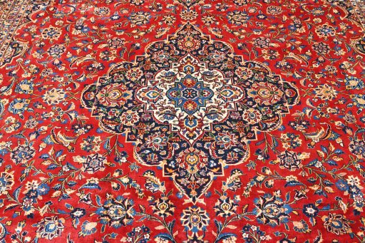 Corner detail of 2000s Kashan rug showing border pattern and Wool pile