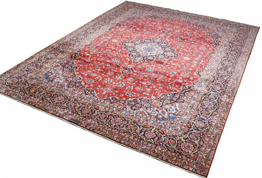 Close-up detail of 2000s Kashan rug from Iran / Persia showing Wool weave