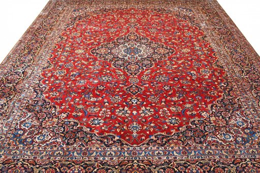 Surface texture of 2000s Kashan rug with natural Wool and intricate pattern
