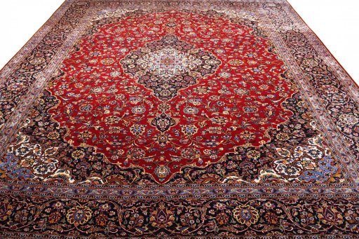 Surface texture of 2000s Kashan rug with natural Wool and intricate pattern