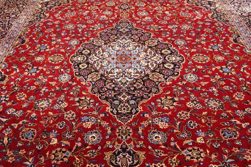 Close-up detail of 2000s Kashan rug from Iran / Persia showing Wool weave