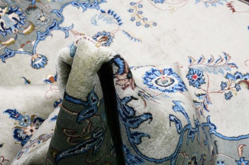 Close-up detail of 2000s Kashan rug from Iran / Persia showing Wool weave