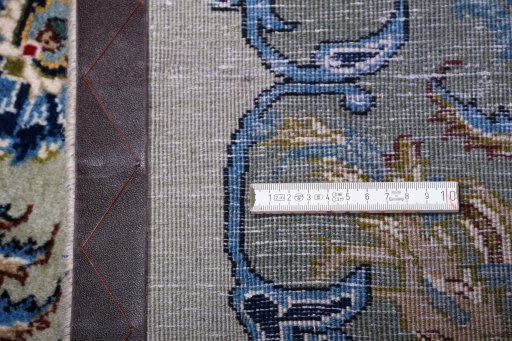 Corner detail of 2000s Kashan rug showing border pattern and Wool pile