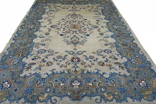 Surface texture of 2000s Kashan rug with natural Wool and intricate pattern