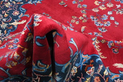 Full view of 2000s Kashan rug from Iran / Persia, 402 × 295 cm in Red tones