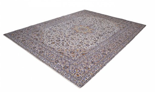 Corner detail of 2000s Kashan rug showing border pattern and Wool pile