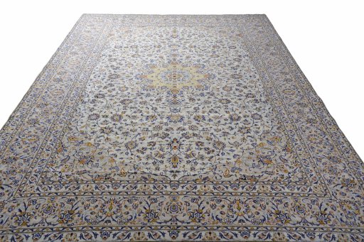 Surface texture of 2000s Kashan rug with natural Wool and intricate pattern