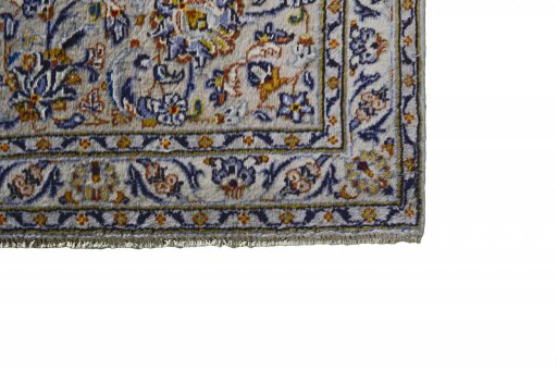 Close-up detail of 2000s Kashan rug from Iran / Persia showing Wool weave