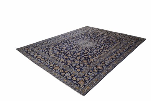 Corner detail of 2000s Kashan rug showing border pattern and Wool pile
