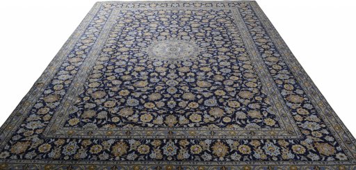 Surface texture of 2000s Kashan rug with natural Wool and intricate pattern
