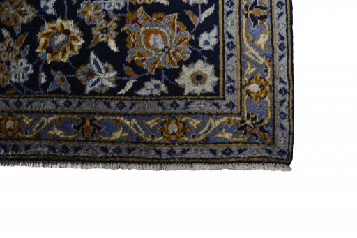 Close-up detail of 2000s Kashan rug from Iran / Persia showing Wool weave